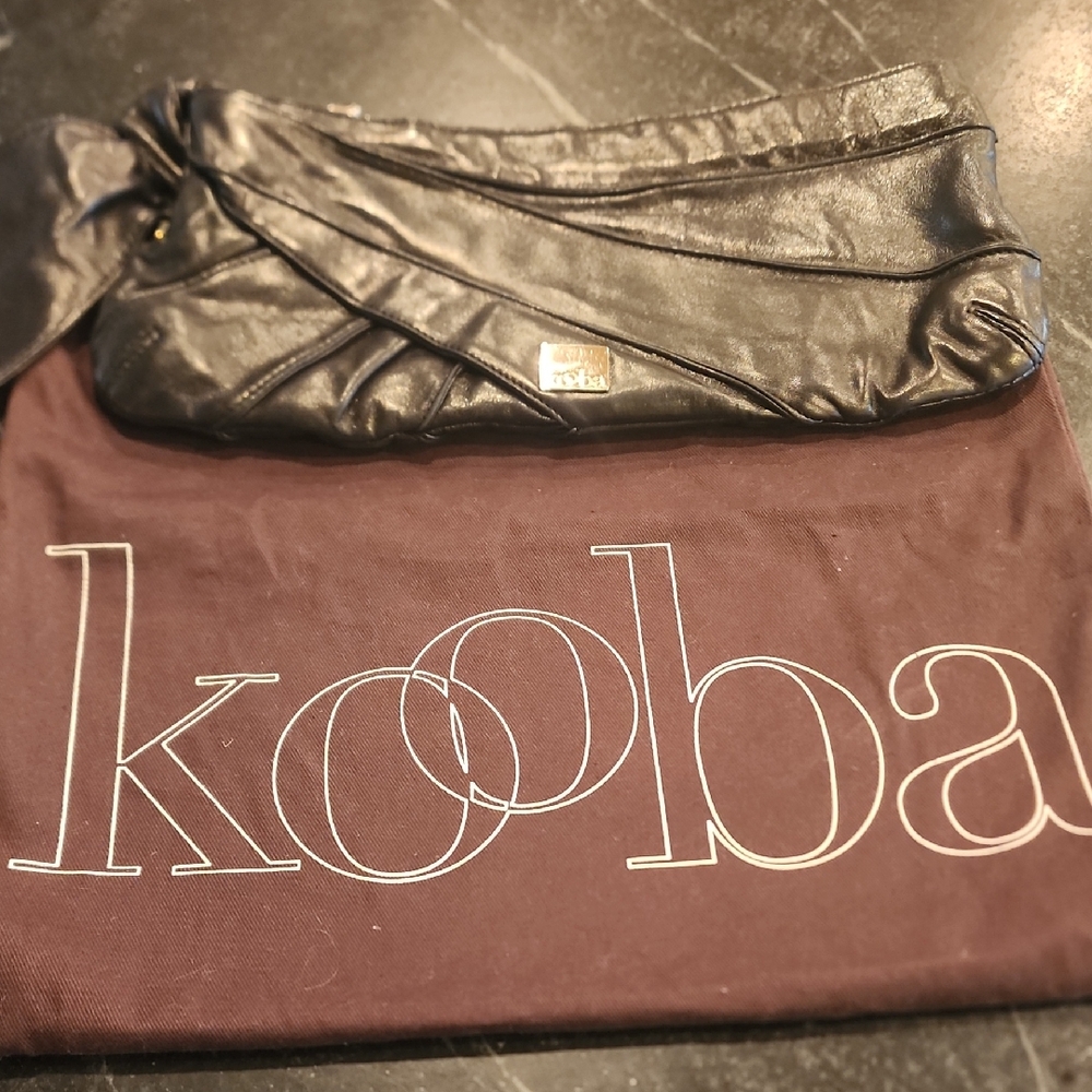Kooba Black Leather Clutch With Stitching Detail And Gold Ring